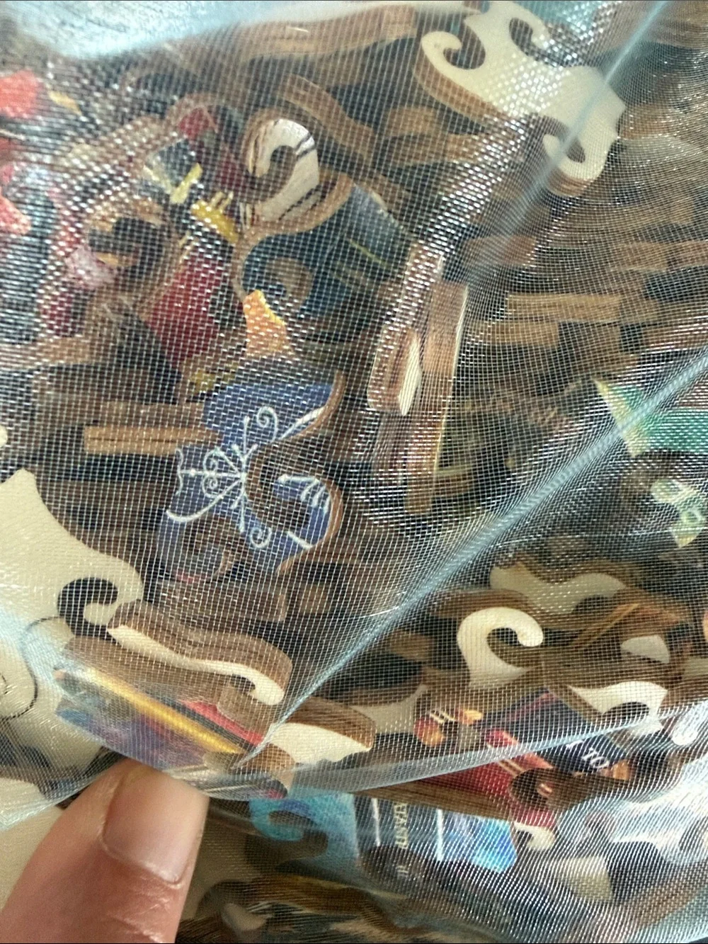 Wooden Puzzle Cat on Bookshelf